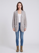 Women's oversized cable knit cardigan with open front and patch pockets