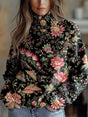 Women's black floral print turtleneck knit sweater with long sleeves