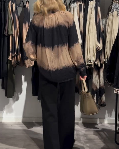 Women's brown and black tie-dye V-neck blouse with long sleeves and buttons