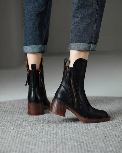 Women's heeled ankle boots with side zippers and tassel details