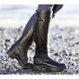 Women's tall riding boots with buckle straps, rounded toes and low heels