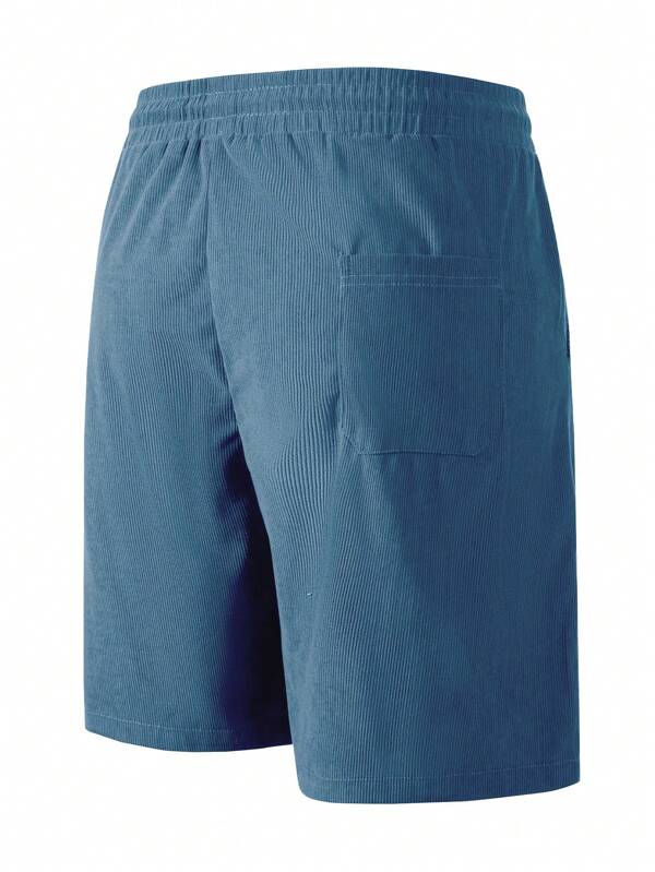 Men's blue corduroy shorts with drawstring waist, relaxed fit, worn with white t-shirt