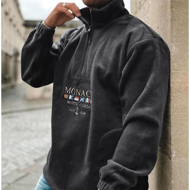 Men's quarter-zip mock neck sweater with graphic front and pouch pocket
