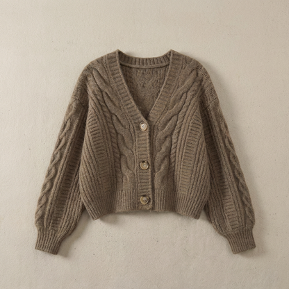 Women's cropped cable knit cardigan with V-neckline, buttons and long sleeves