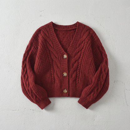 Women's cropped cable knit cardigan with V-neckline, buttons and long sleeves