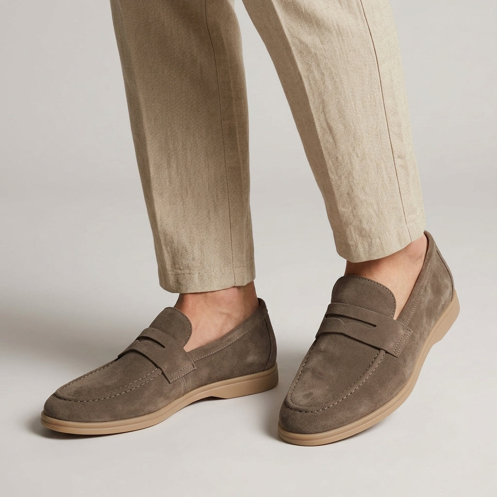 Men's plain penny loafers with moc toe stitching and low heels