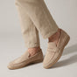 Men's plain penny loafers with moc toe stitching and low heels