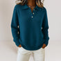 Women's collared knit sweater with button placket and long sleeves