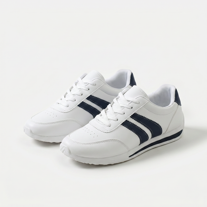White lace-up sneakers with navy side stripes and flat soles