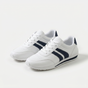 White lace-up sneakers with navy side stripes and flat soles