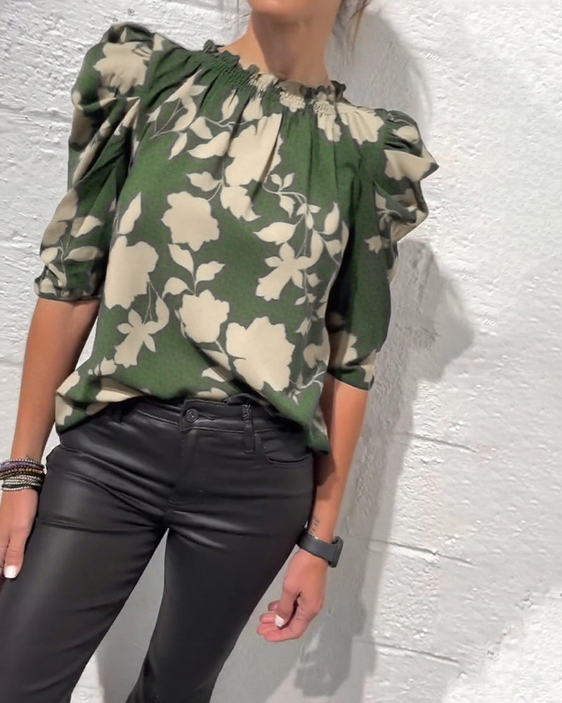 Women's floral blouse with ruched round neckline and 3/4 puff sleeves