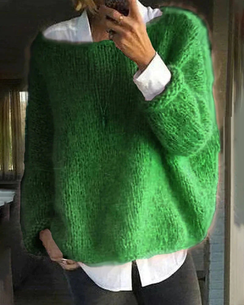 Women's relaxed textured knit sweater with crew neckline and long sleeves