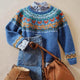 Women's blue Fair Isle sweater with colourful patterned yoke