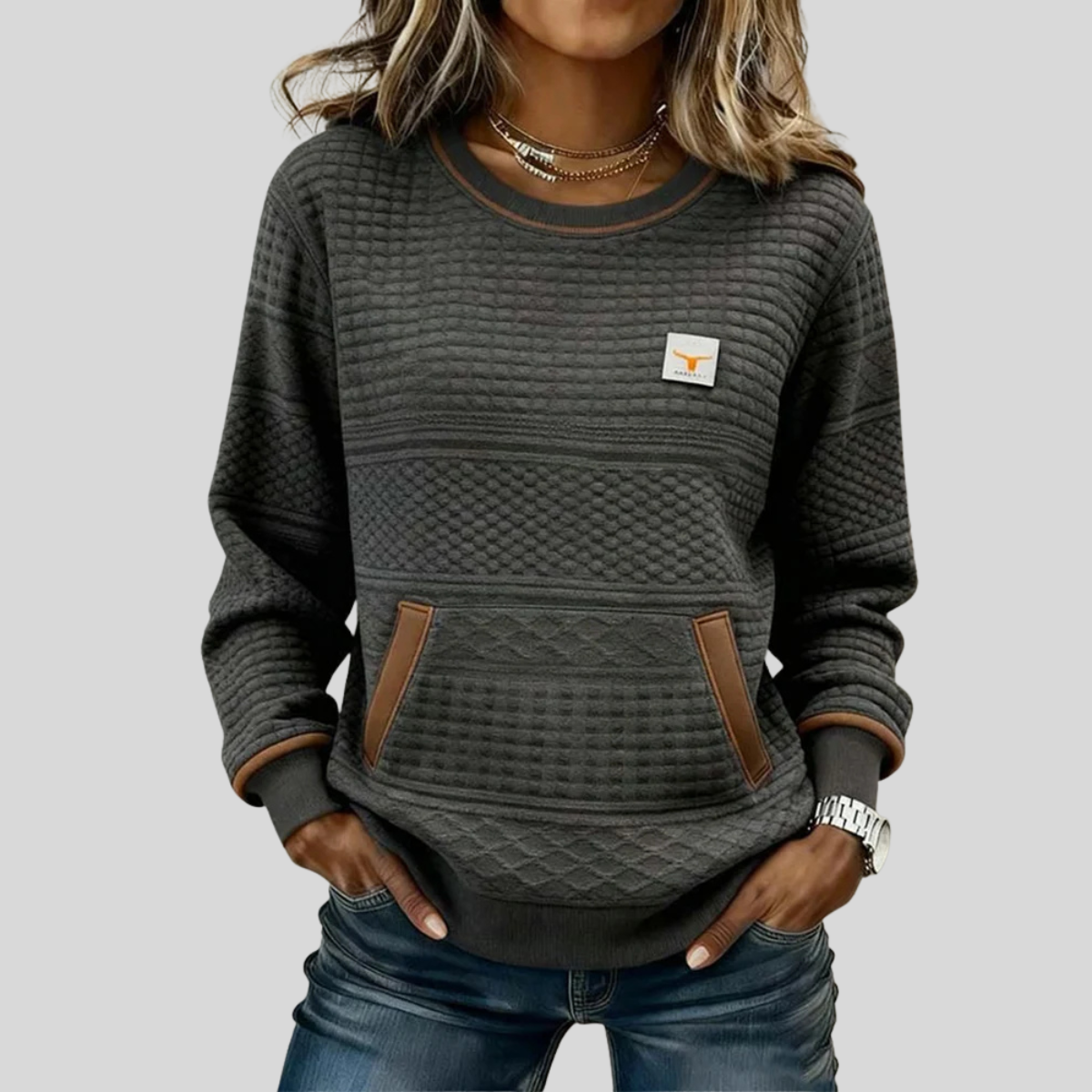 Women's textured crew neck sweatshirt with long sleeves and front kangaroo pocket