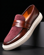 Slip-on penny loafer with textured vamp panel and flat contrast sole