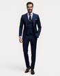 Men's three-piece suit with notched lapels, buttoned waistcoat and tailored trousers