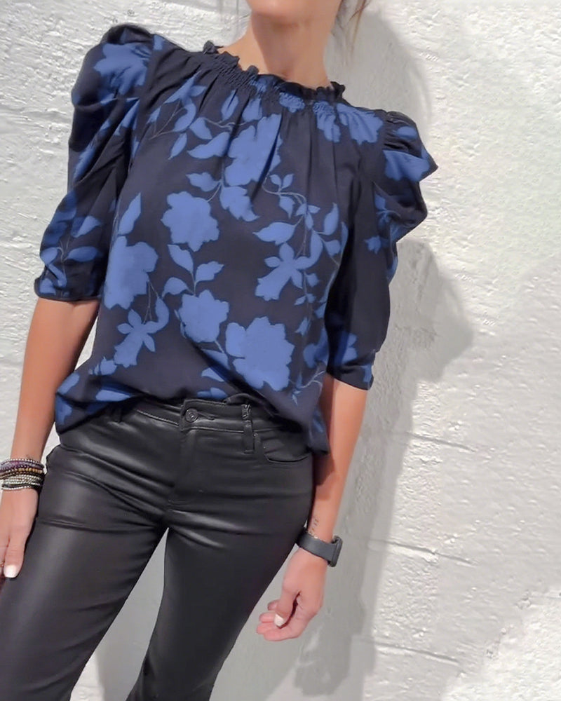 Women's floral blouse with ruched round neckline and 3/4 puff sleeves