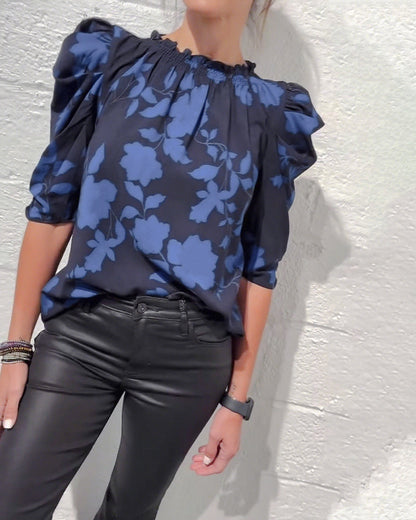 Women's floral blouse with ruched round neckline and 3/4 puff sleeves