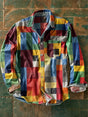 Men's multicolor plaid long-sleeve button-up shirt with chest pocket and curved hem