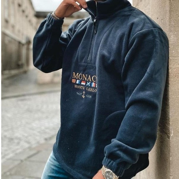 Men's quarter-zip mock neck sweater with graphic front and pouch pocket