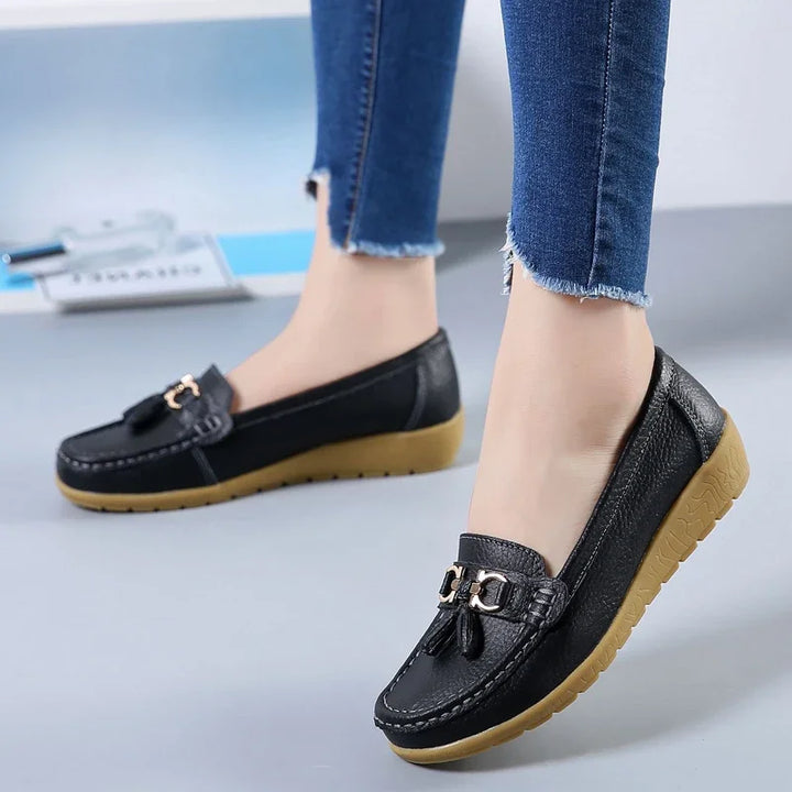 Women's moc toe loafers with tassel and metal details