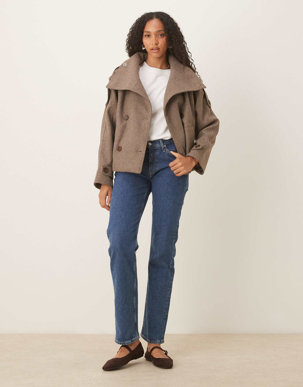 Women's brown funnel-neck coat with button front and long sleeves