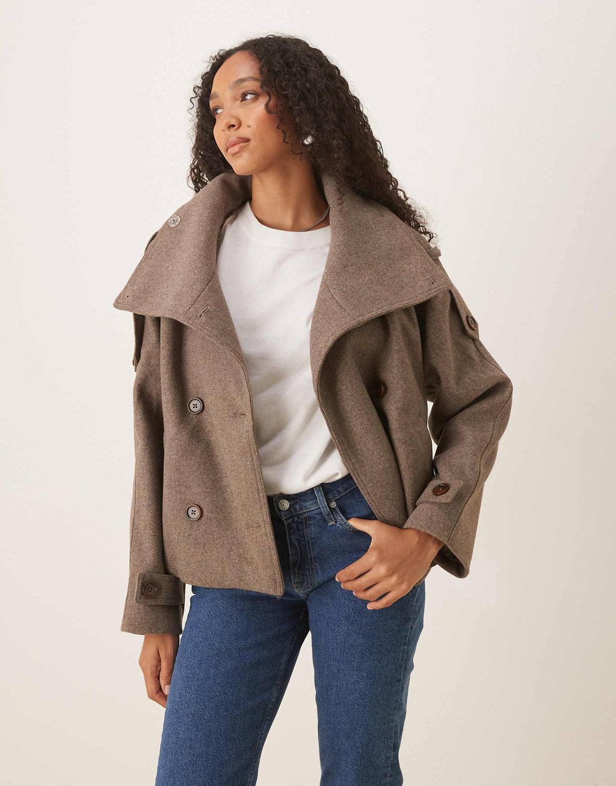 Women's brown funnel-neck coat with button front and long sleeves
