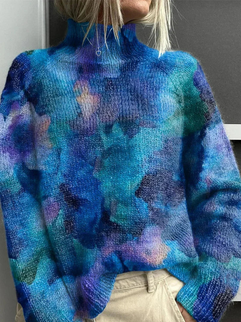 Women's long-sleeve patterned turtleneck sweater shown in illustrated and abstract designs