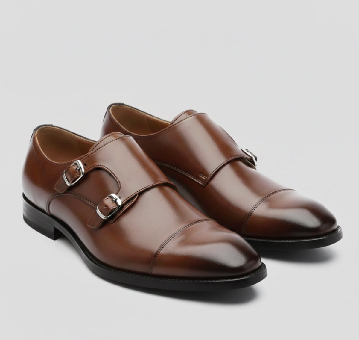Men's double monk strap shoes with almond toes and buckle closures