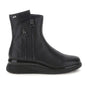 Black ankle boots with twin side zippers and platform soles