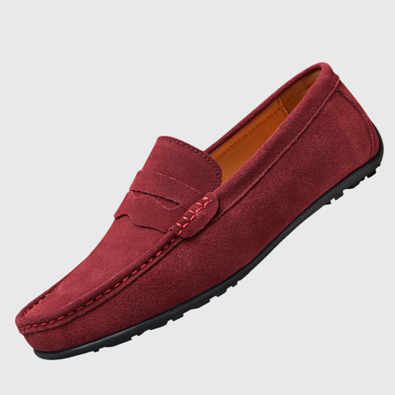 Classic slip-on loafers with penny strap and moc-toe stitching