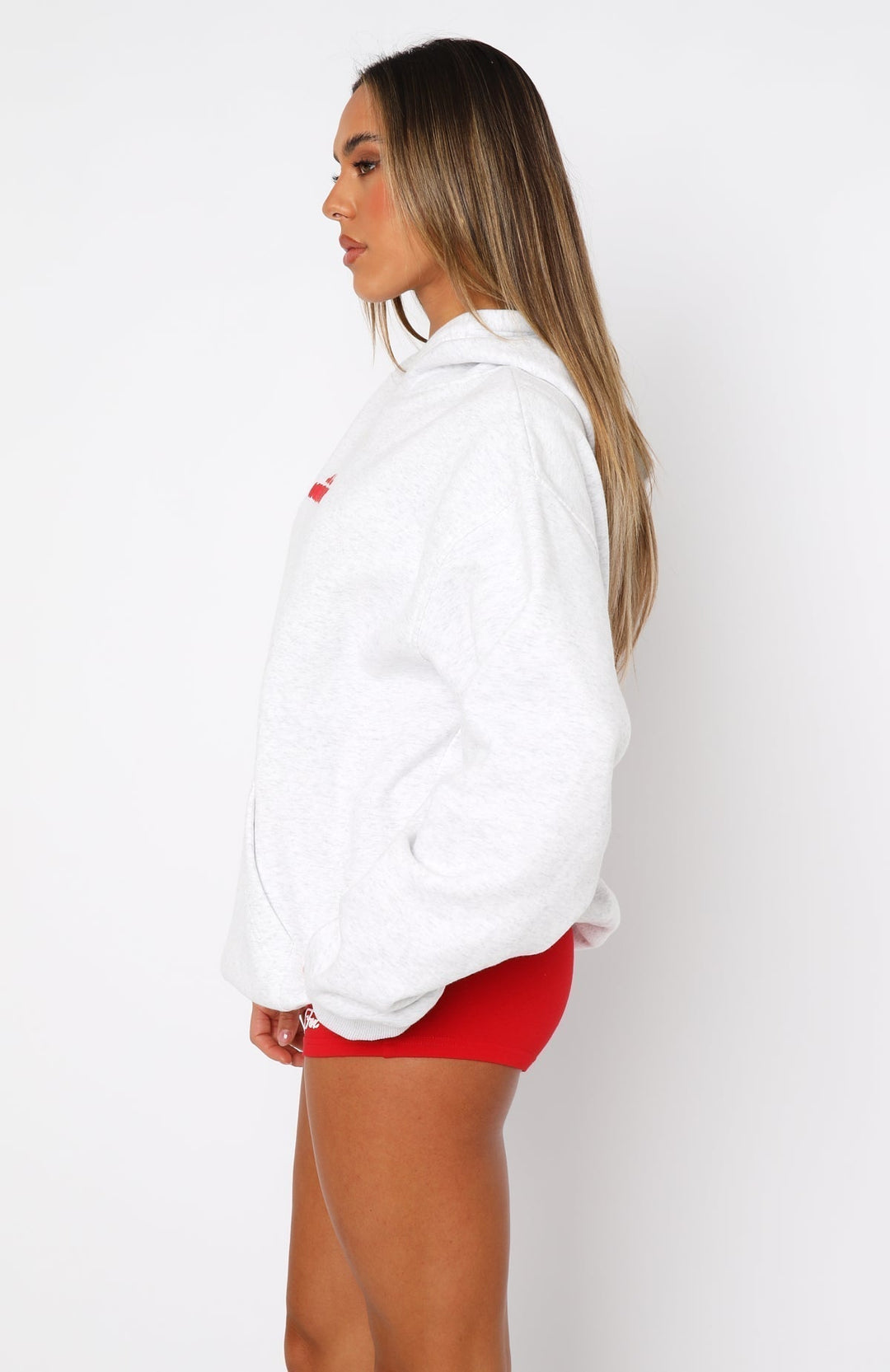 Women's white oversized hoodie with red lettering and cherry graphic