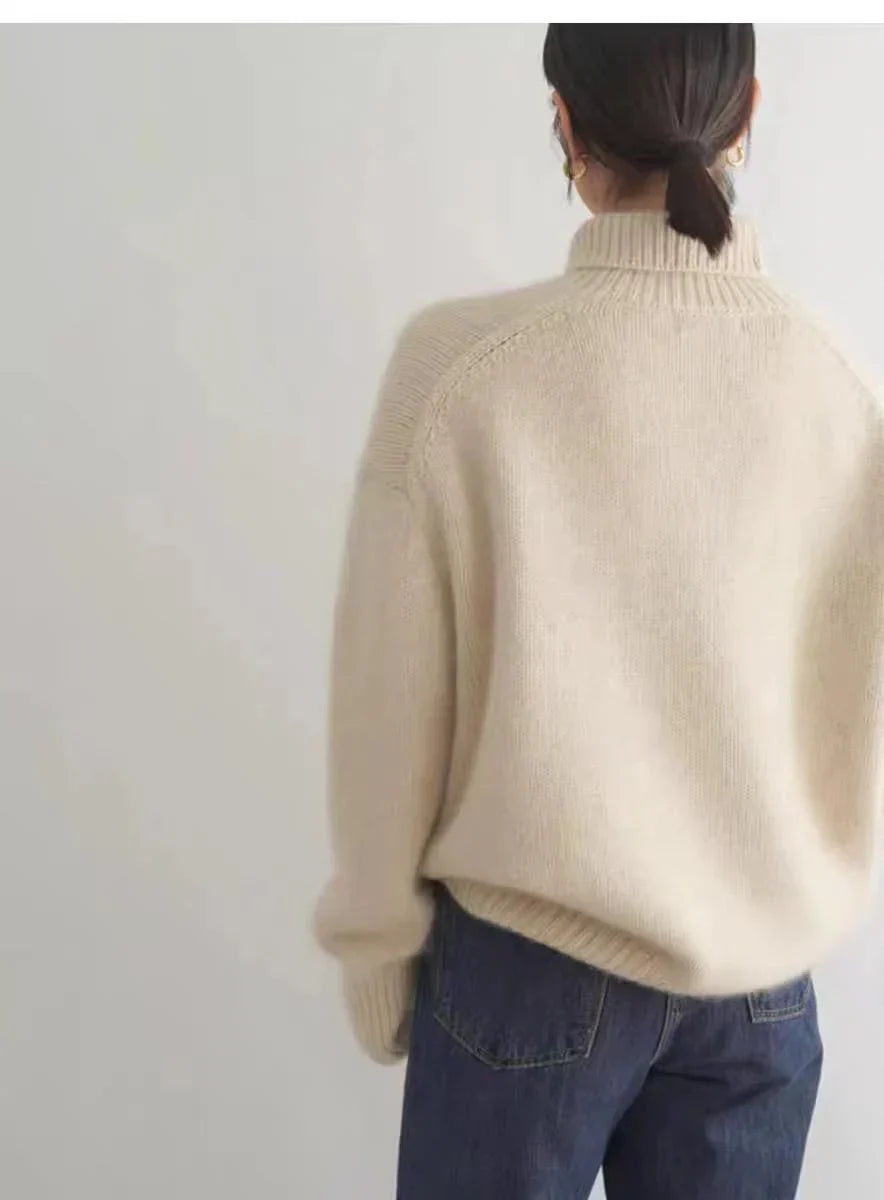 Women's relaxed turtleneck sweater with long sleeves and ribbed trims