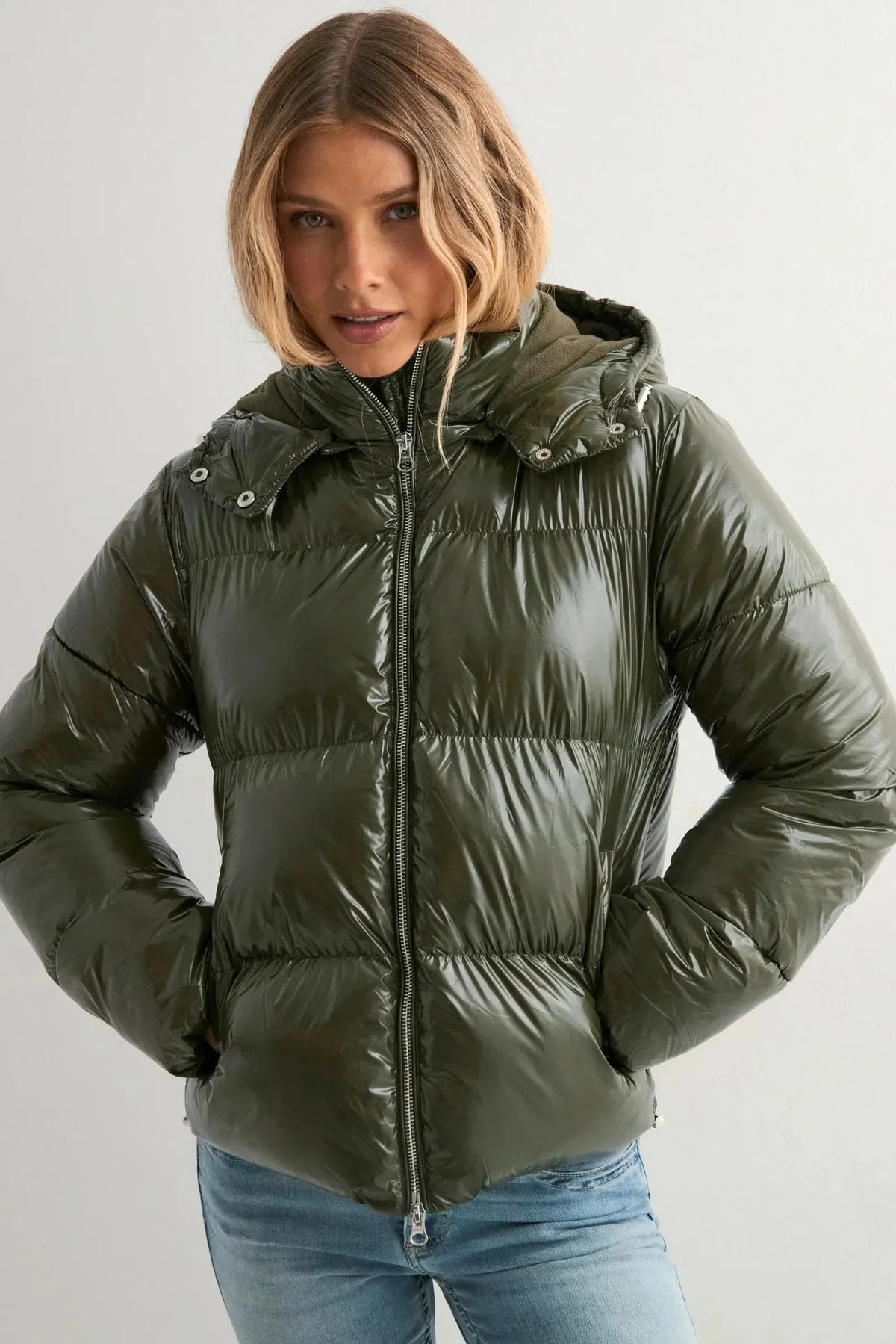 Women's glossy hooded puffer jacket with long sleeves and zip front