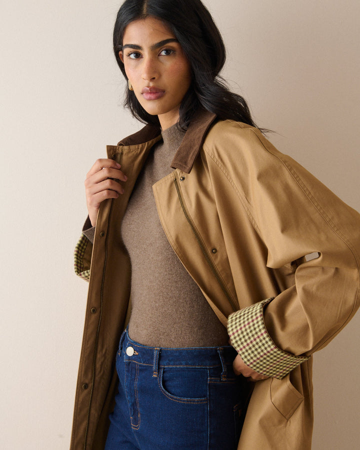 Women's brown crew neck knit jumper with long sleeves