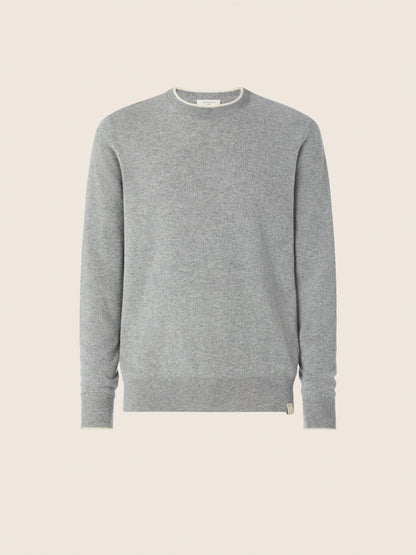 Gray crew neck knit sweater with long sleeves and ribbed trims