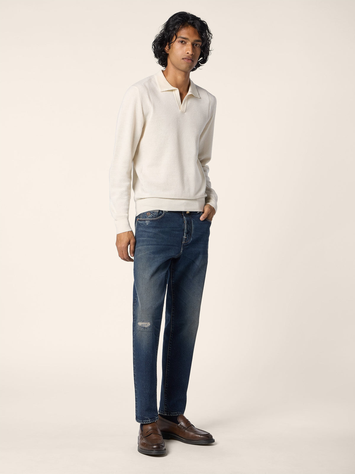 Men's cream long-sleeve polo sweater with folded collar and ribbed cuffs
