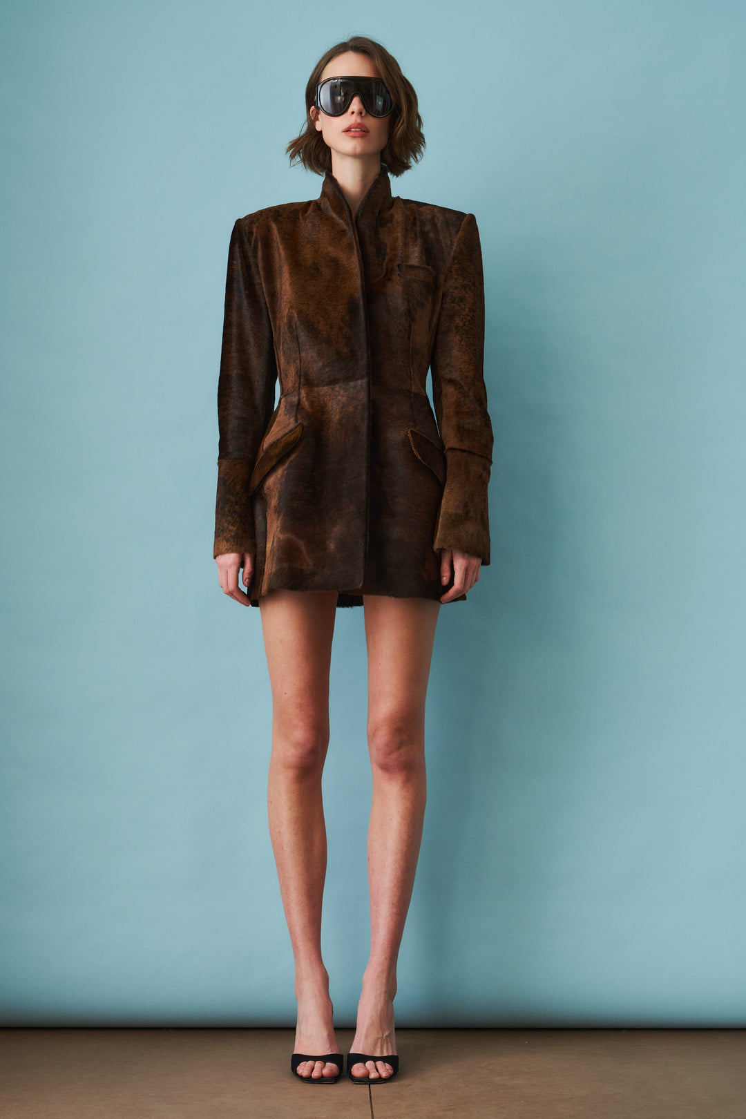 Women's brown fitted blazer with stand collar and flap pockets