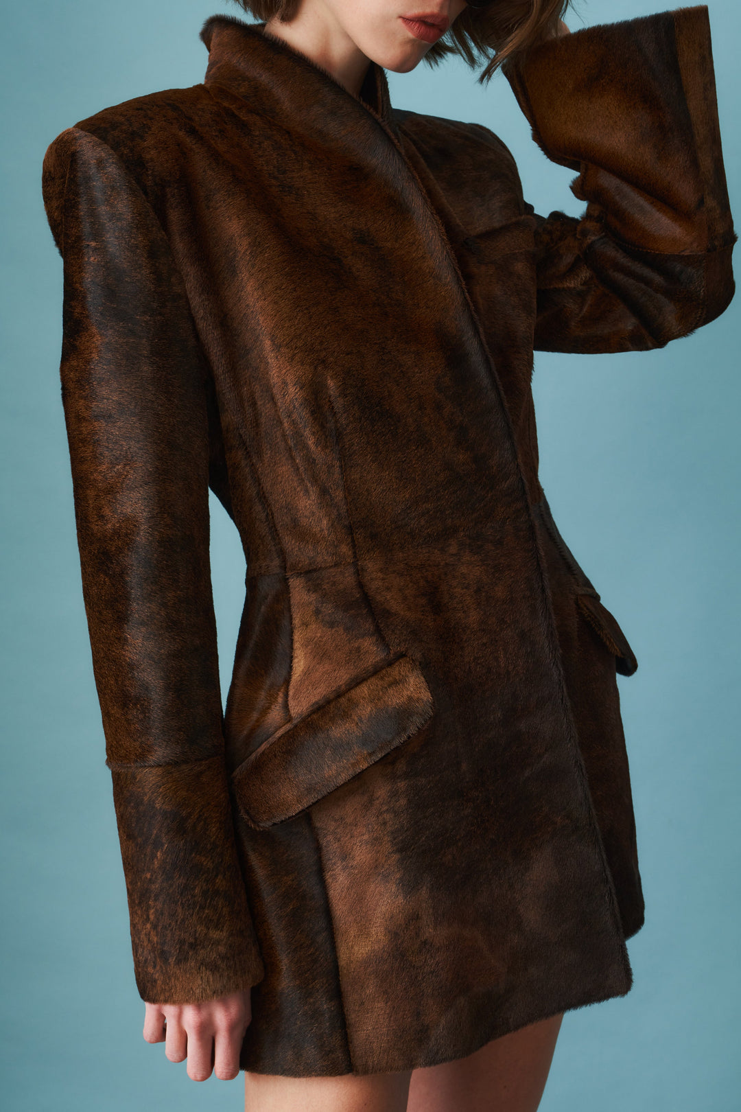 Women's brown fitted blazer with stand collar and flap pockets