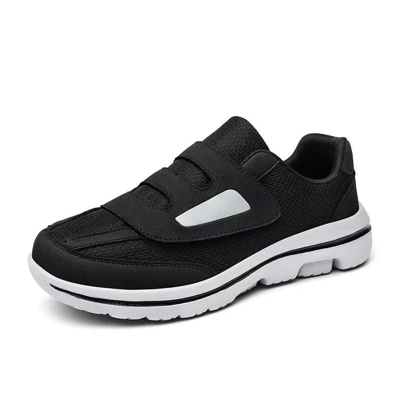 Women's wide toe slip-on sneakers with hook-and-loop straps and layered soles