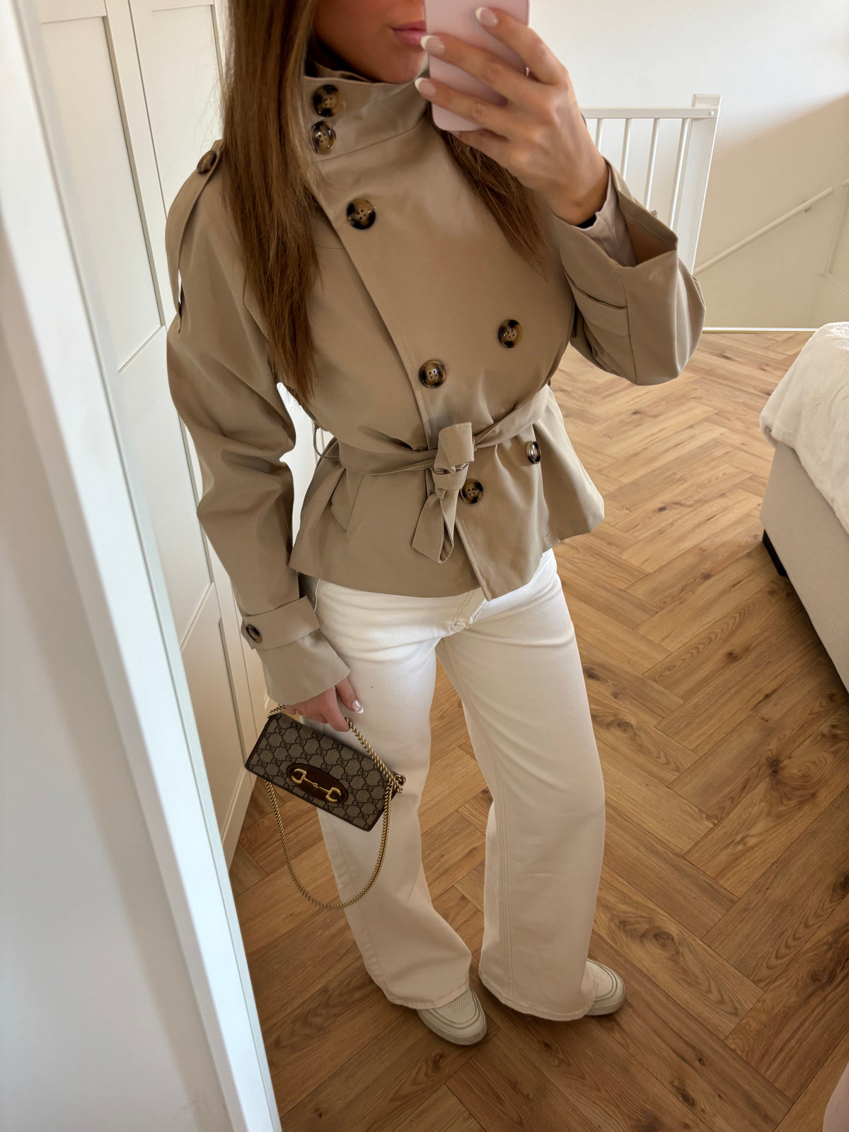Women's beige cropped trench jacket with high collar and tie belt