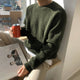 Unisex ribbed crew neck sweater in green and white, long sleeves, relaxed fit