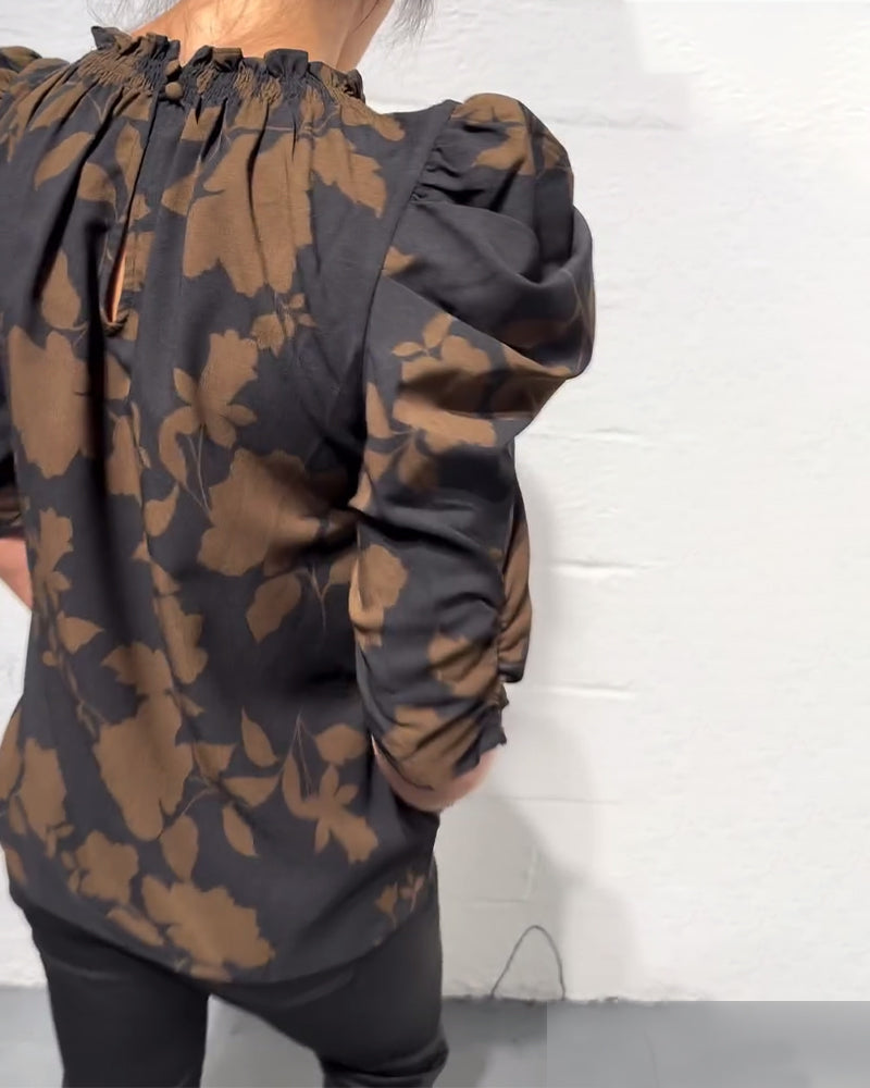 Women's floral blouse with ruched round neckline and 3/4 puff sleeves