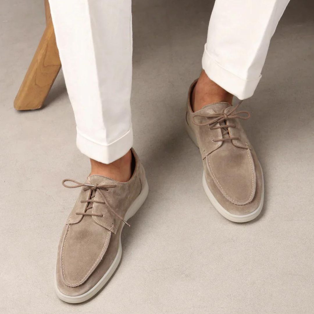 Men's lace-up moc toe loafers shown in navy blue and beige with light soles