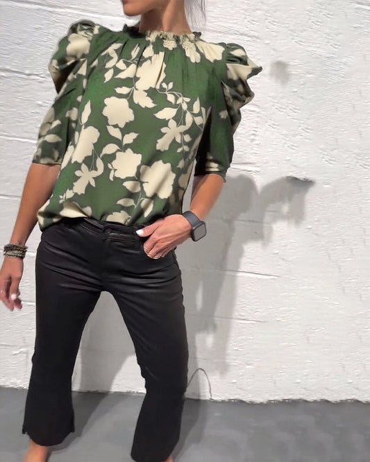 Women's floral blouse with ruched round neckline and 3/4 puff sleeves