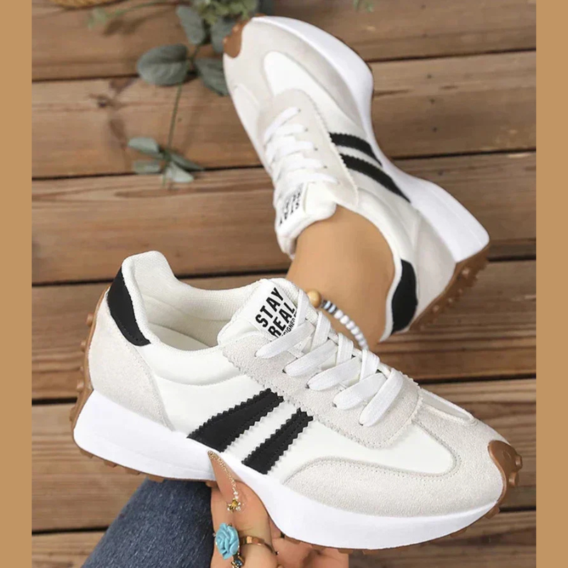 Women's retro lace-up sneakers with striped side panels and flat textured soles