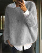 Women's relaxed textured knit sweater with crew neckline and long sleeves