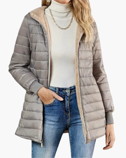Women's quilted hooded jacket with long sleeves and zip front