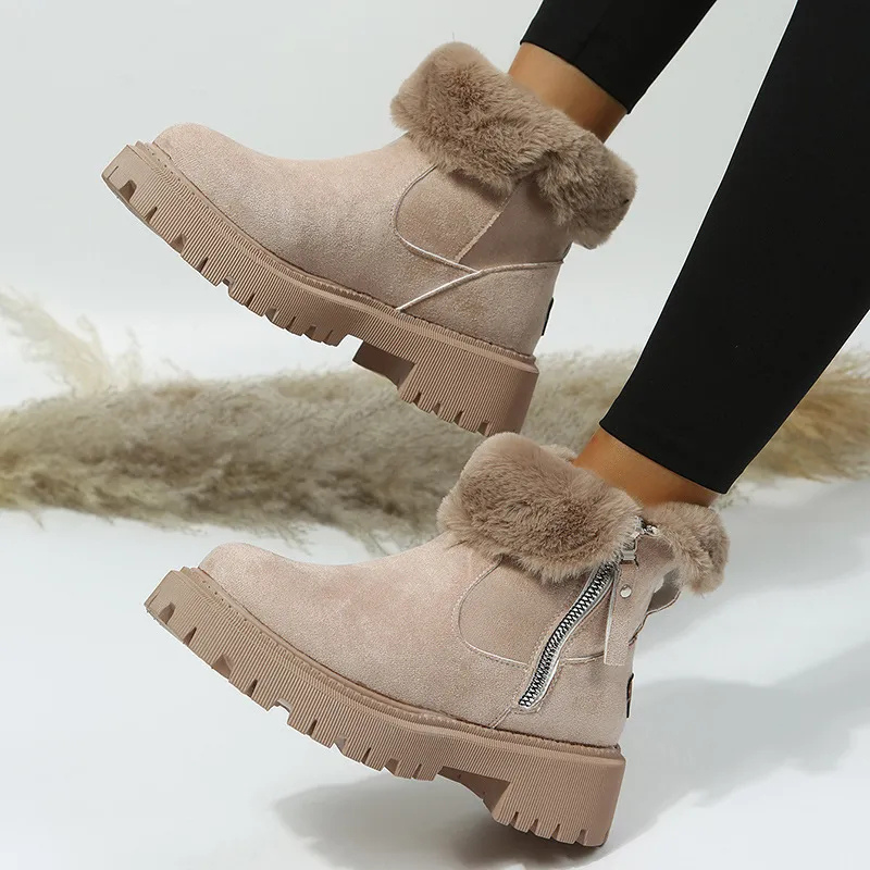 Women's ankle boots with plush fur cuffs, side zippers and lug soles