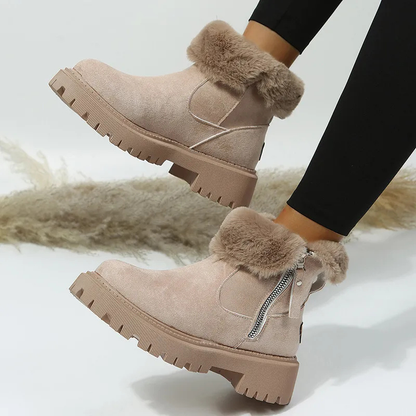 Women's ankle boots with plush fur cuffs, side zippers and lug soles